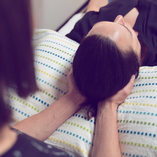 In person Reiki - hands under head