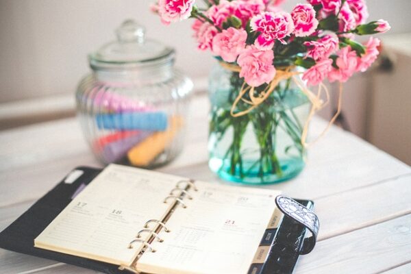 Organiser on a table with flowers