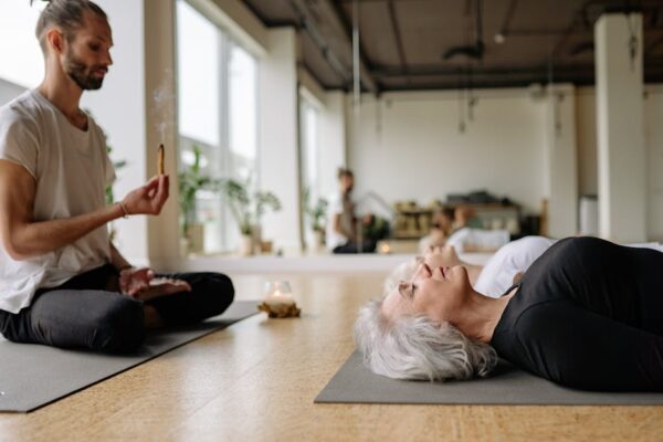 group-reiki-session-incense-meditation.jpg Reiki Group session in a serene studio with incense and relaxation.